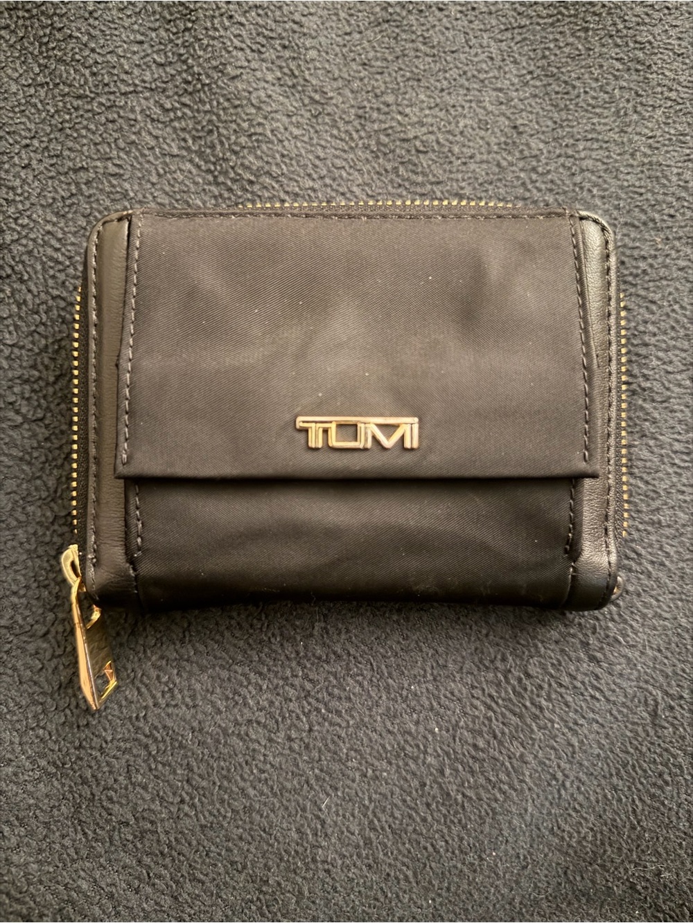 Tumi Black Compact Zip Wallet with Gold Logo